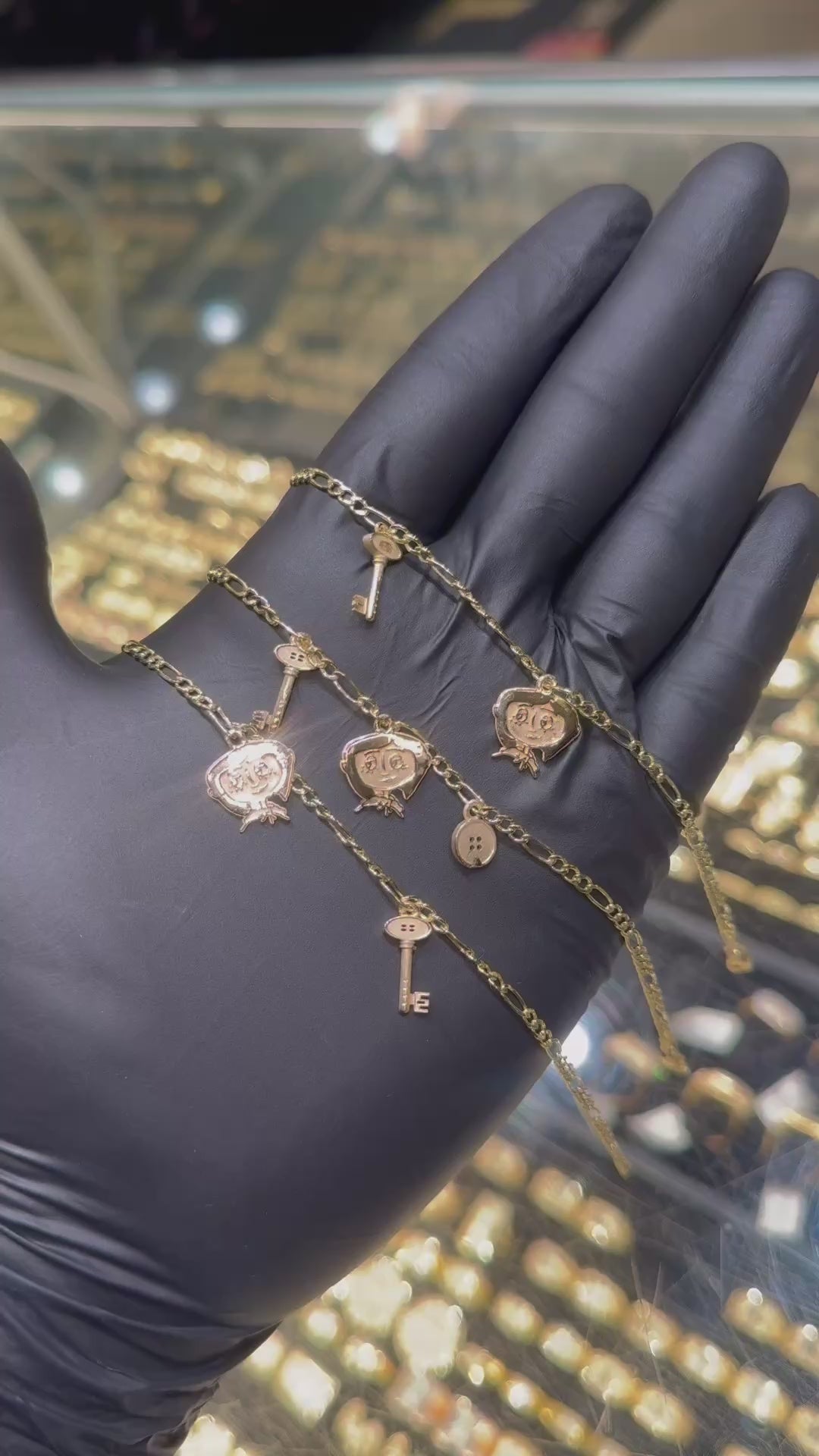 Load video: Coraline Charm Figaro Bracelet