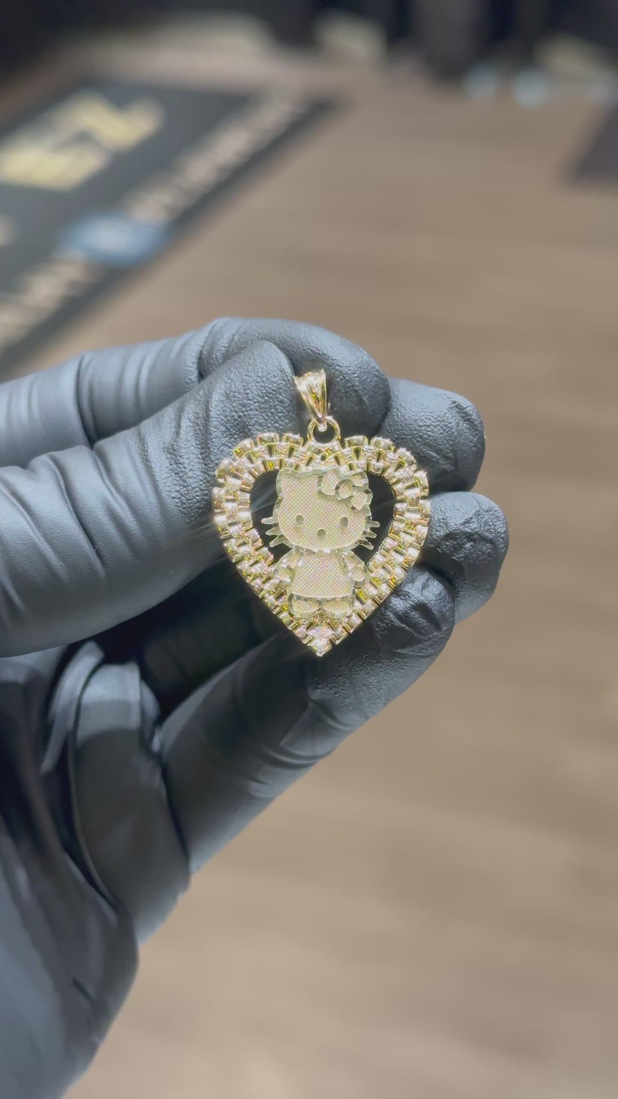 Load video: 10k Hello Kitty Full Body Rolex Heart Pendant