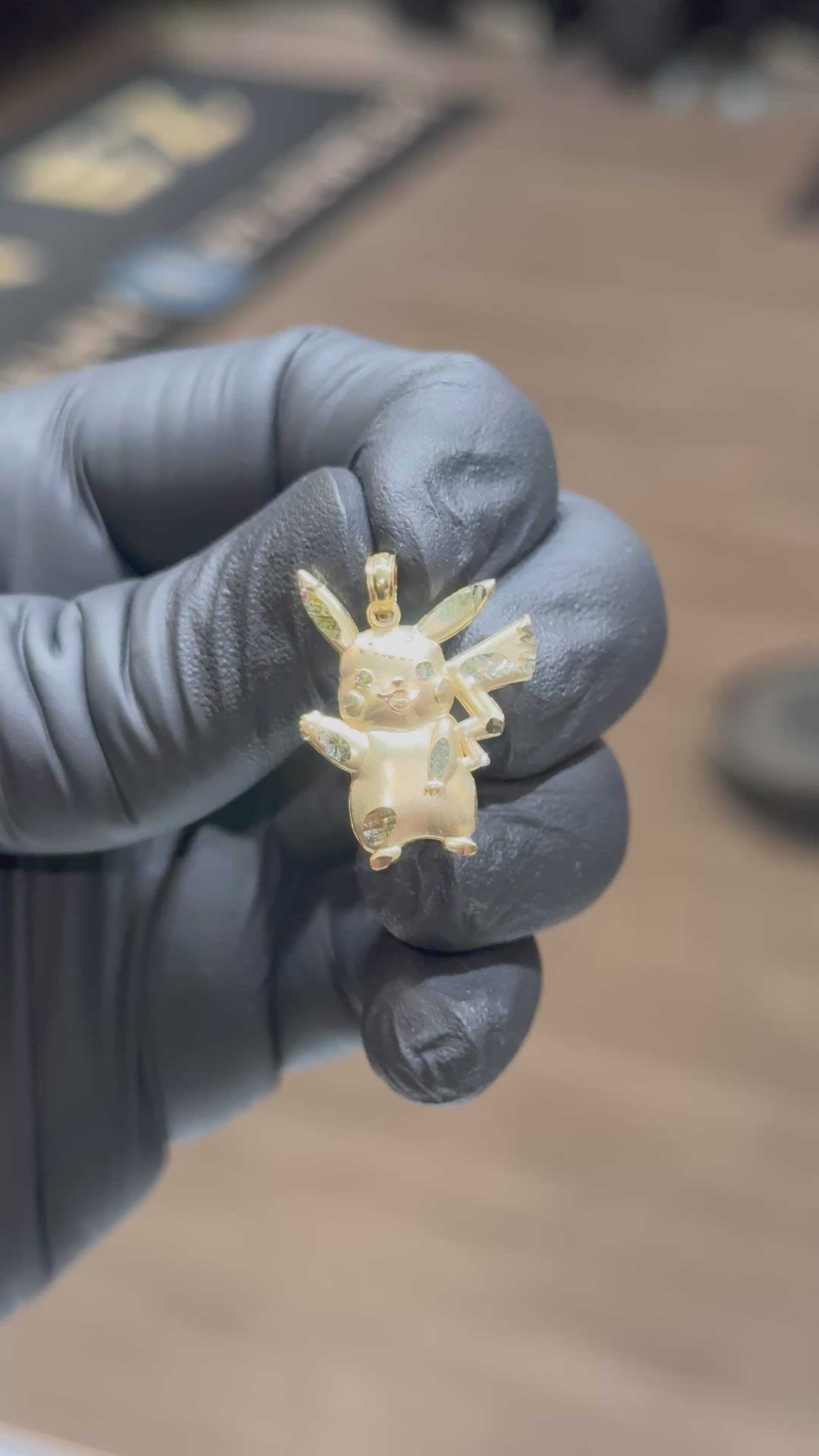 Load video: 10k Pikachu Pendant