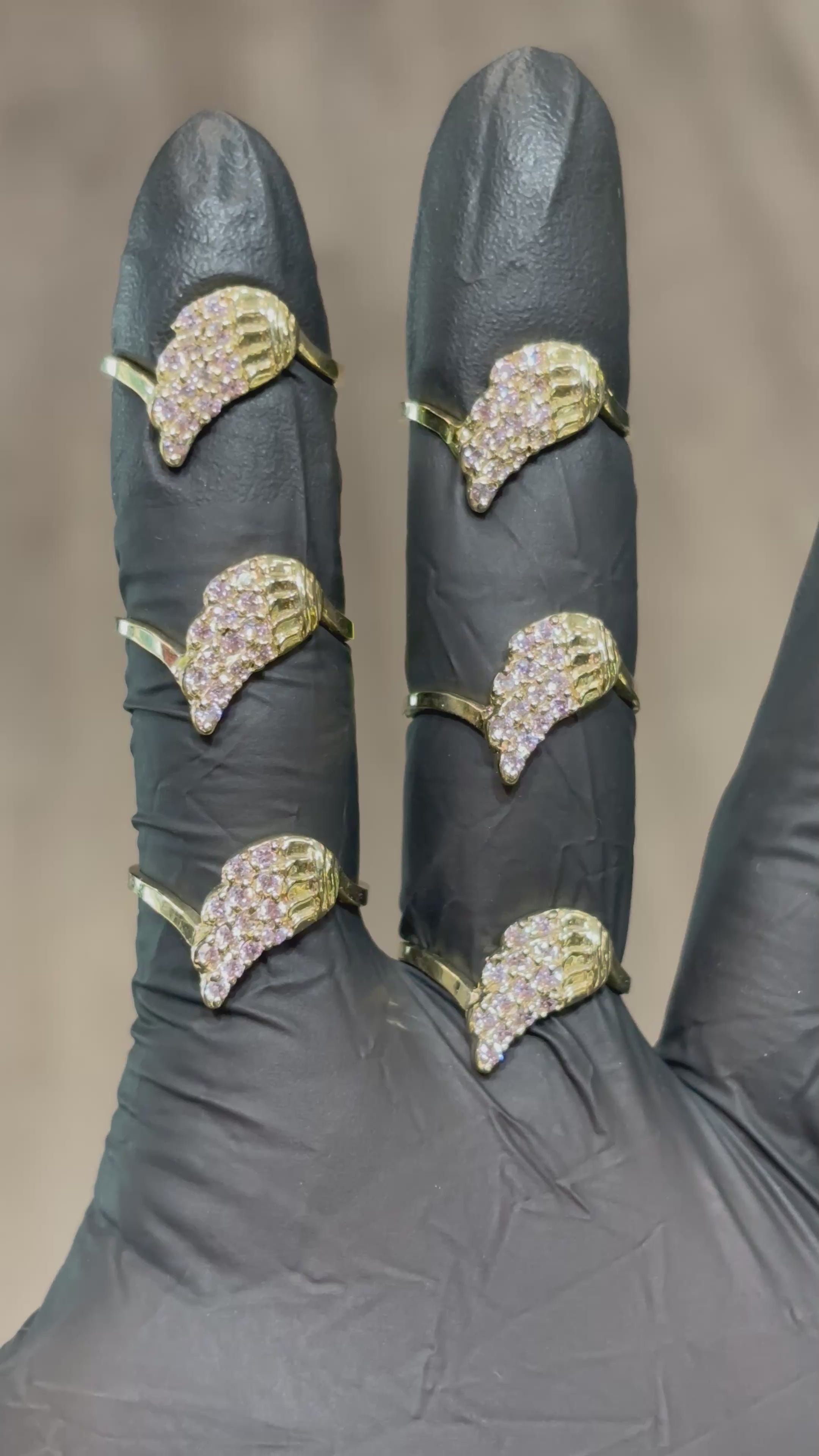 Load video: 10k Crystal Angel Wing Ring