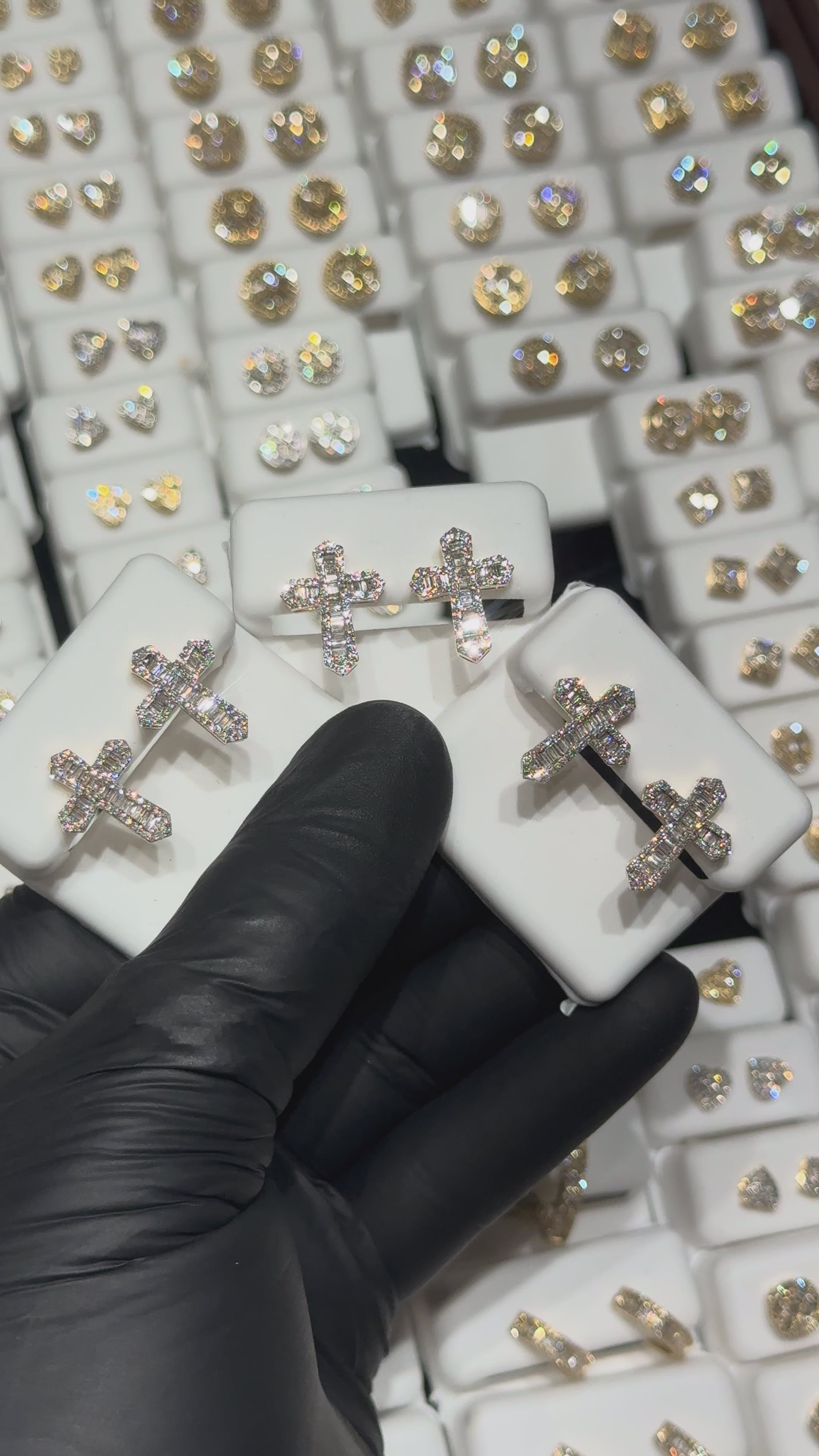 Load video: 10k Si1 Natural Round/Baguette Cross Earring