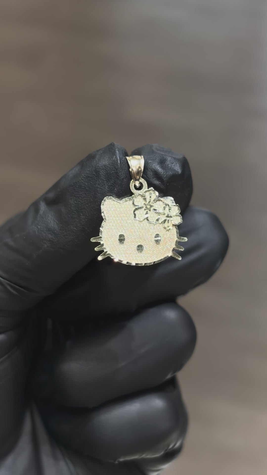 10k Hello Kitty Hibiscus Pendant