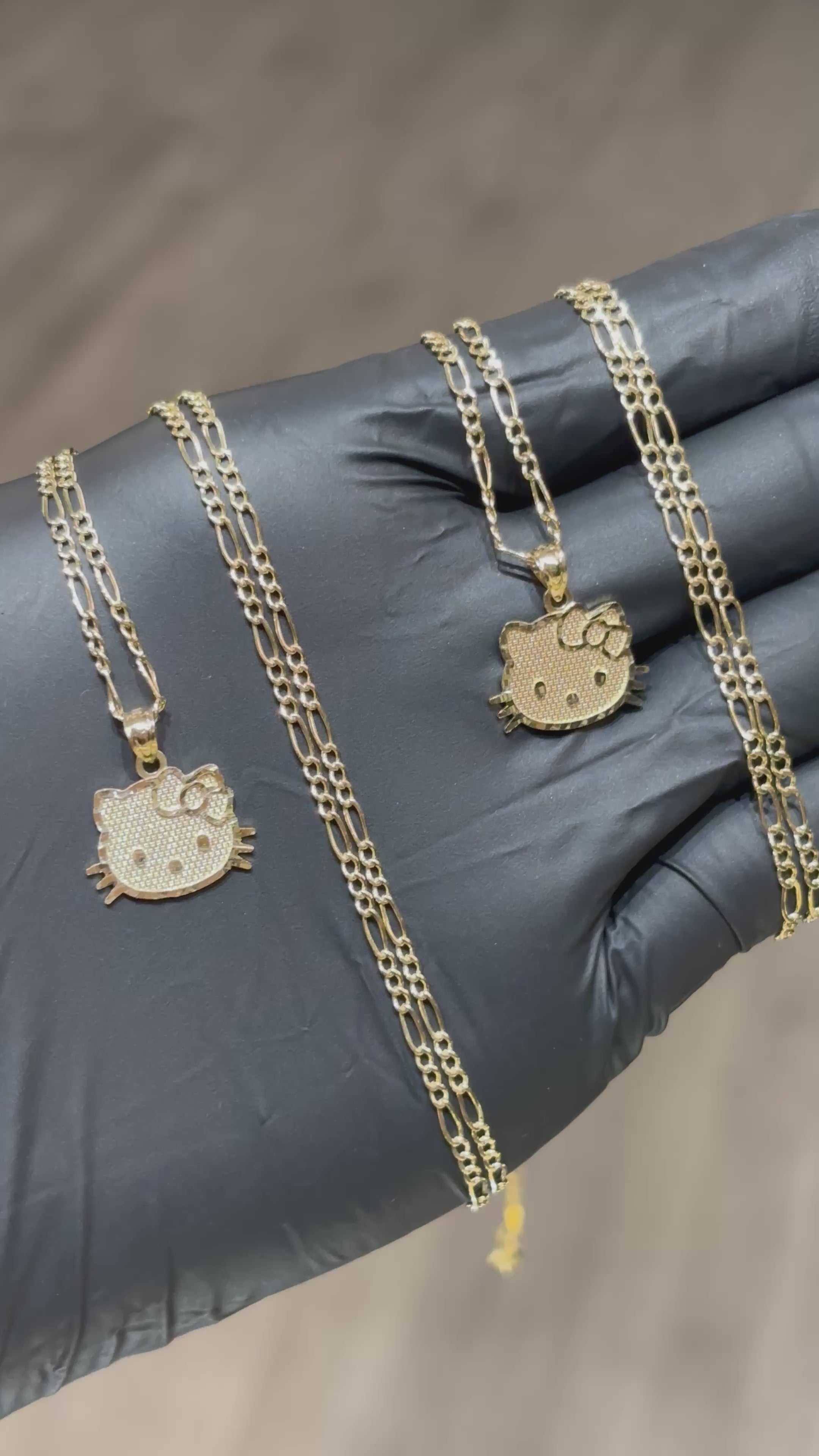 Load video: 10k Small Hello Kitty Head Chain Set