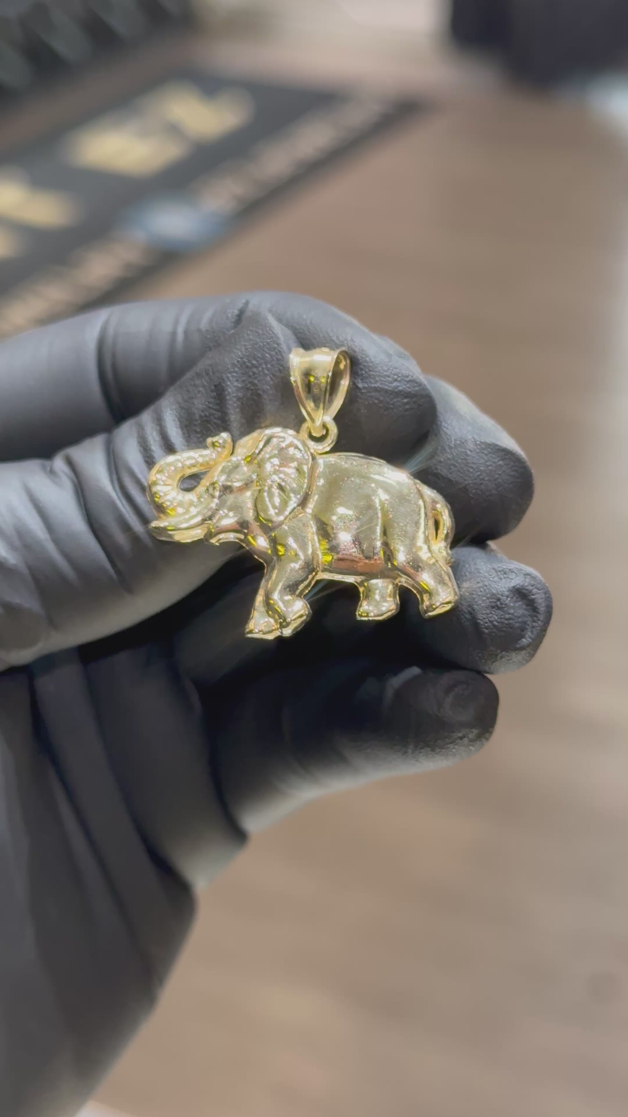 Load video: 10k Elephant Pendant