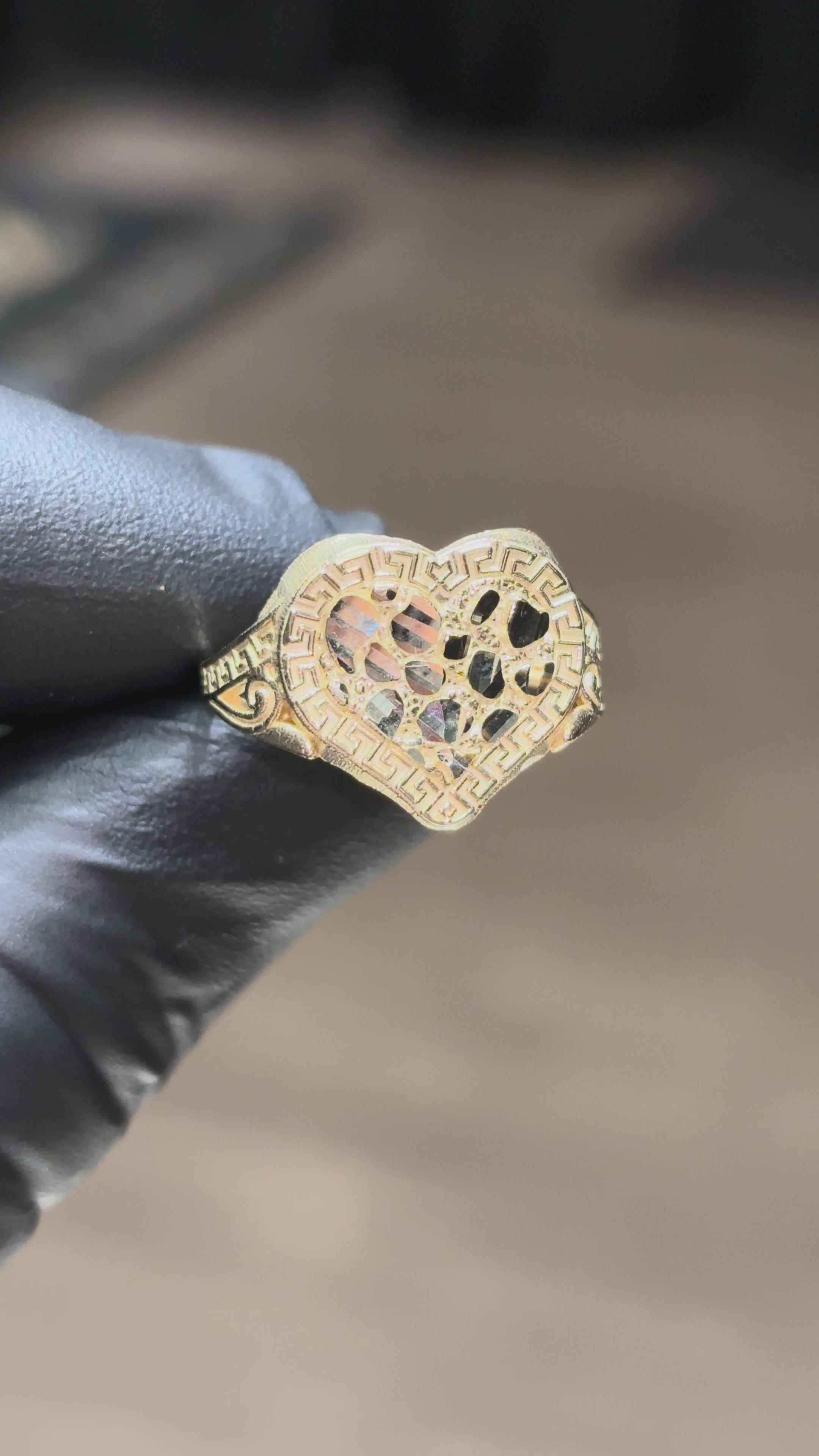 Load video: 10k Versace Bordered Heart Nugget Ring